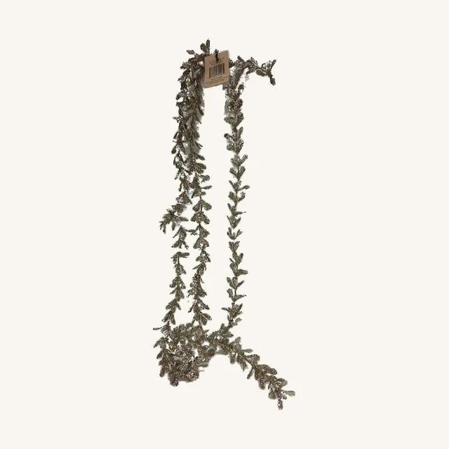Actual champagne glitter faux boxwood garland with its original fine leaves, both ends and attached tag