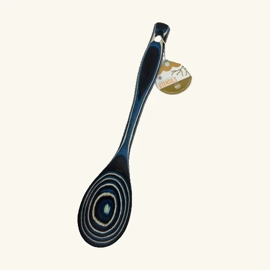 Complete blue black and cream Abyss solid cooking spoon with its original attached tag