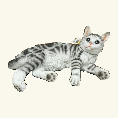 Reclining gray tabby cat figurine with its original hang tag and cord.