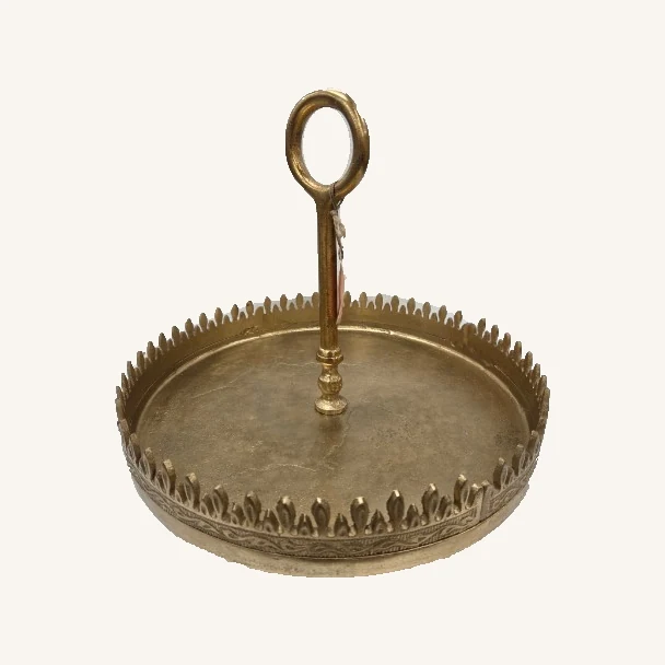 One antique-gold round tray stand with a pointed openwork rim, embossed band and central oval ring handle