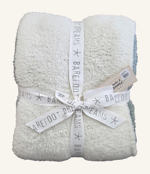 Beach Glass Multi CozyChic Cova Center Stripe throw by Barefoot Dreams, folded with its original white ribbon and attached tags.