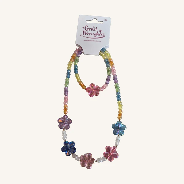 Blooming Beads necklace with five colorful flowers and matching single-flower bracelet, shown with their complete Great Pretenders retail card.