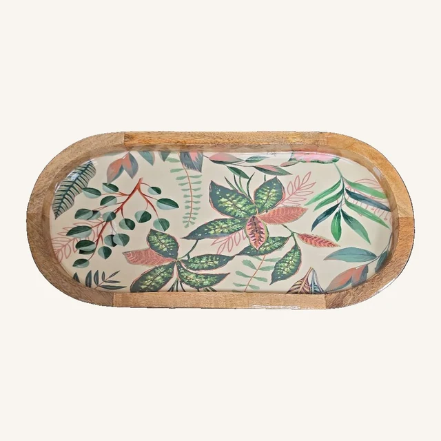 Oval wooden tray with its actual cream botanical base, green and pink leaves and complete wood rim