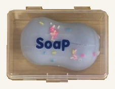 One actual purple Crisp Soap squishy toy in its original clear case; colors vary.