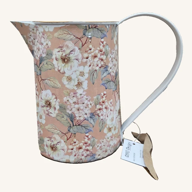 Actual peach floral decorative pitcher with pink-and-white blossoms, blue-green leaves, pale curved handle, gold-tone rim and original attached tag