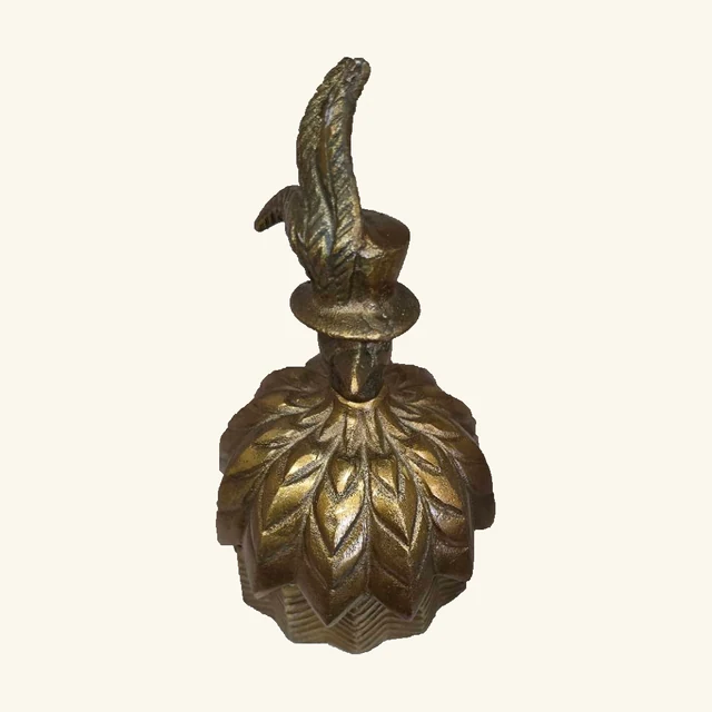 Complete gold-toned Emerson decorative box with raised leaf pattern and rabbit head wearing a top hat