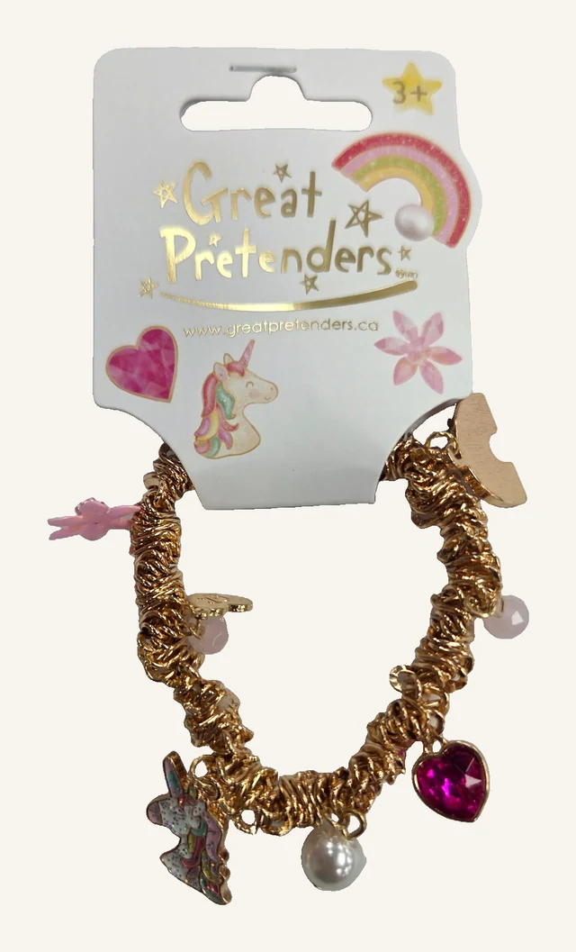 Actual Fairytale Wonderland bracelet with gold-tone links, unicorn and pink heart charms
