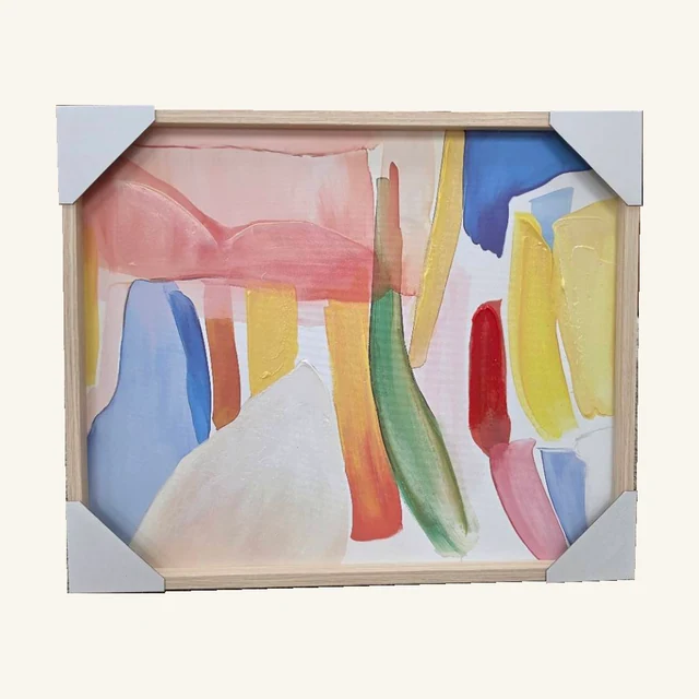 Pastel Abstract Framed Canvas Wall Art. Airy blocks and flowing shapes in pink, blue and warm yellow give this framed abstract its easygoing character.
