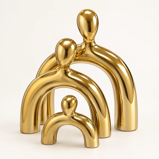 Gold Ceramic Family Figures — Set of Three