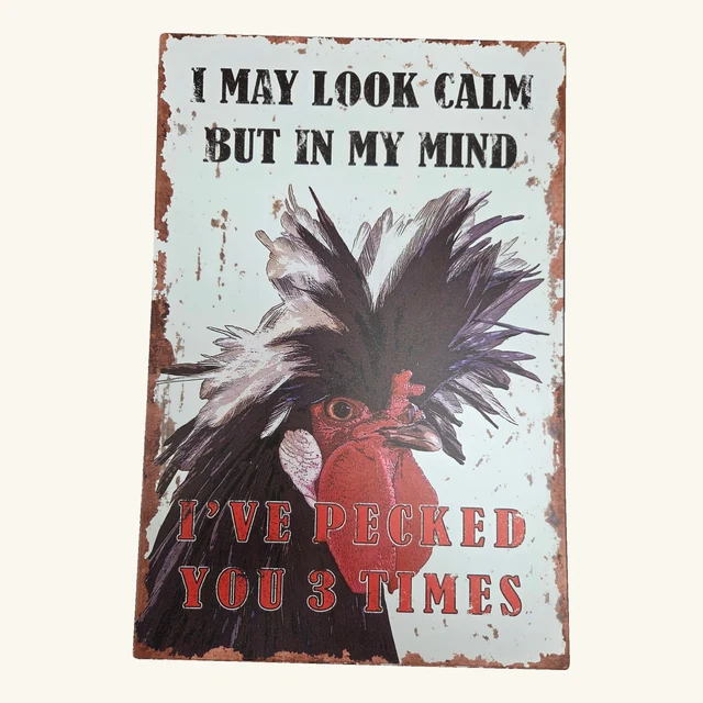 Complete decorative rooster tin sign reading I MAY LOOK CALM BUT IN MY MIND I'VE PECKED YOU 3 TIMES, with its original distressed border and rounded corners