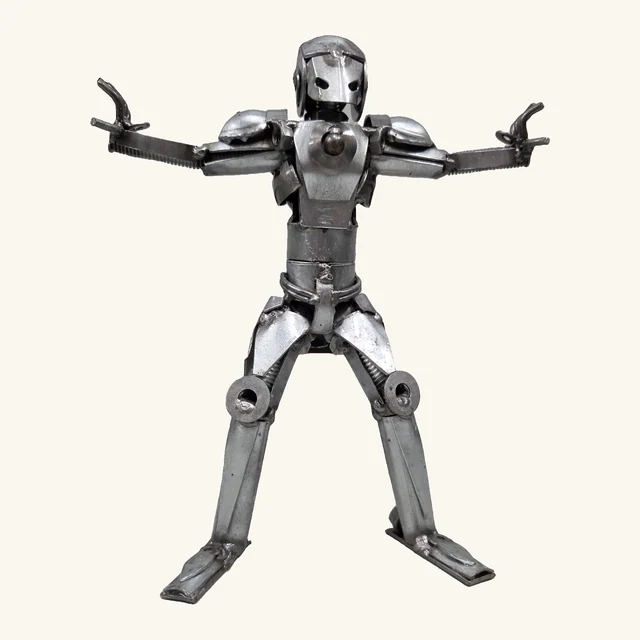 Iron Man metal sculpture with a silver-toned helmet, complete shoulder plates, outstretched mechanical arms, bent fingers and two broad feet.
