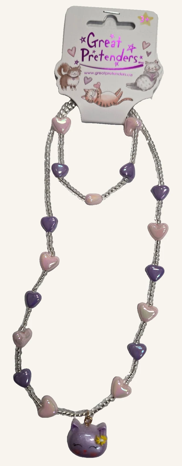 The actual complete Lovely Kitty necklace and bracelet set with pink and purple heart beads, silver-tone beads and a purple kitty pendant with yellow flower.