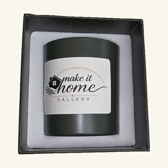 Make It Home Gallery Frasier Fir Candle — 8 oz. Bring a forest-inspired scent home with the gallery’s Frasier Fir candle in a dark green jar.