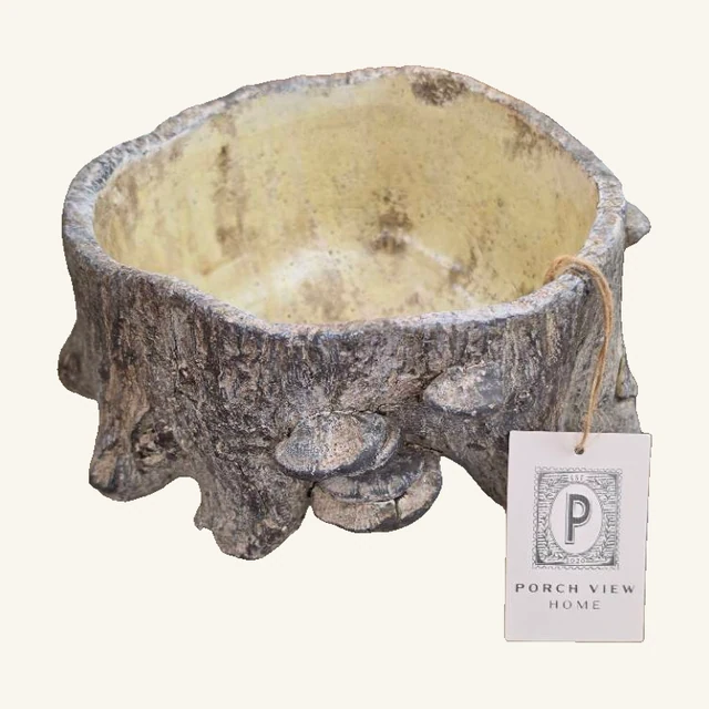 Medium faux bois cement planter with bark texture, open interior and original attached Porch View Home tag