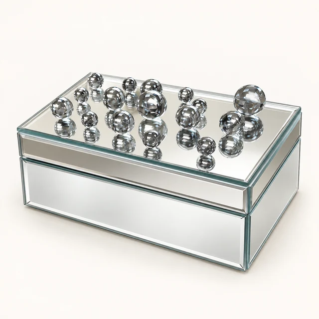 Rectangular mirrored jewelry box with a closed lid decorated by clustered clear faceted spheres