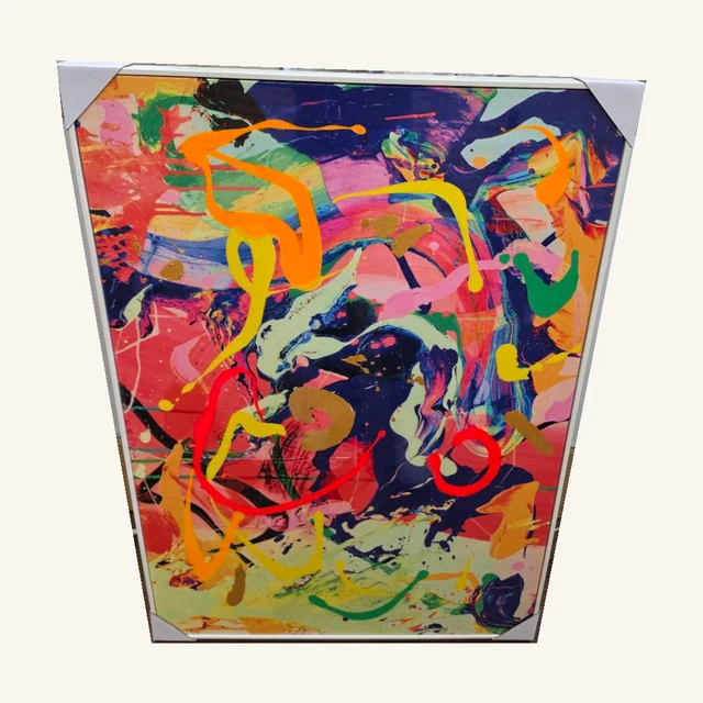 Multicolored Abstract Canvas Wall Art. Sweeps of bright color cross a layered abstract background for a lively statement wall.