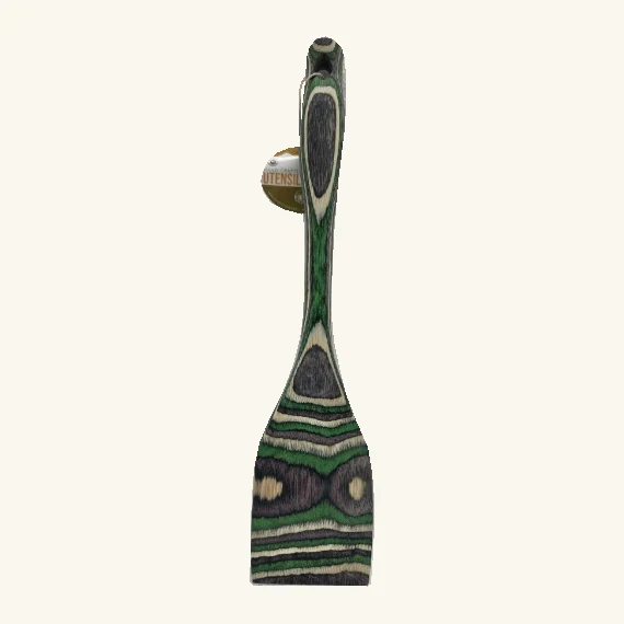 Complete Mystic 12-inch flat-head spatula with green, purple and cream bands, retaining its original attached round supplier tag and string