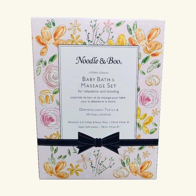 Complete floral Noodle & Boo Baby Bath and Massage Set retail box with original navy bow design and lettering