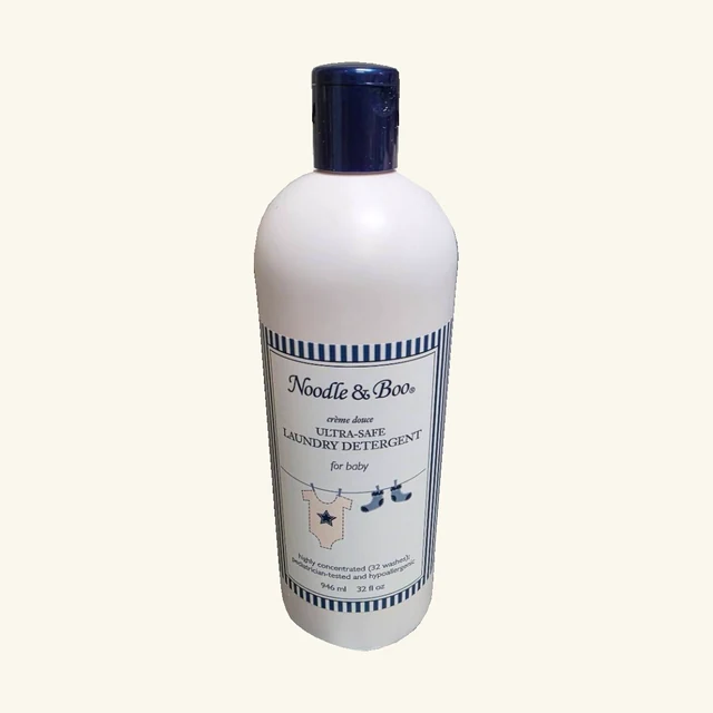 One complete original white Noodle & Boo laundry detergent bottle with navy cap and striped 32 fl oz label