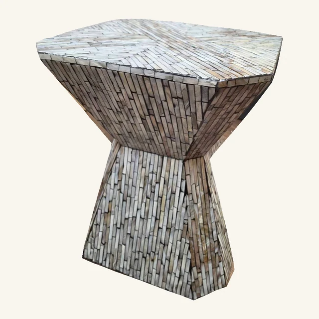 Hourglass-shaped accent table covered in narrow pearlescent ivory, gray and taupe mosaic tiles