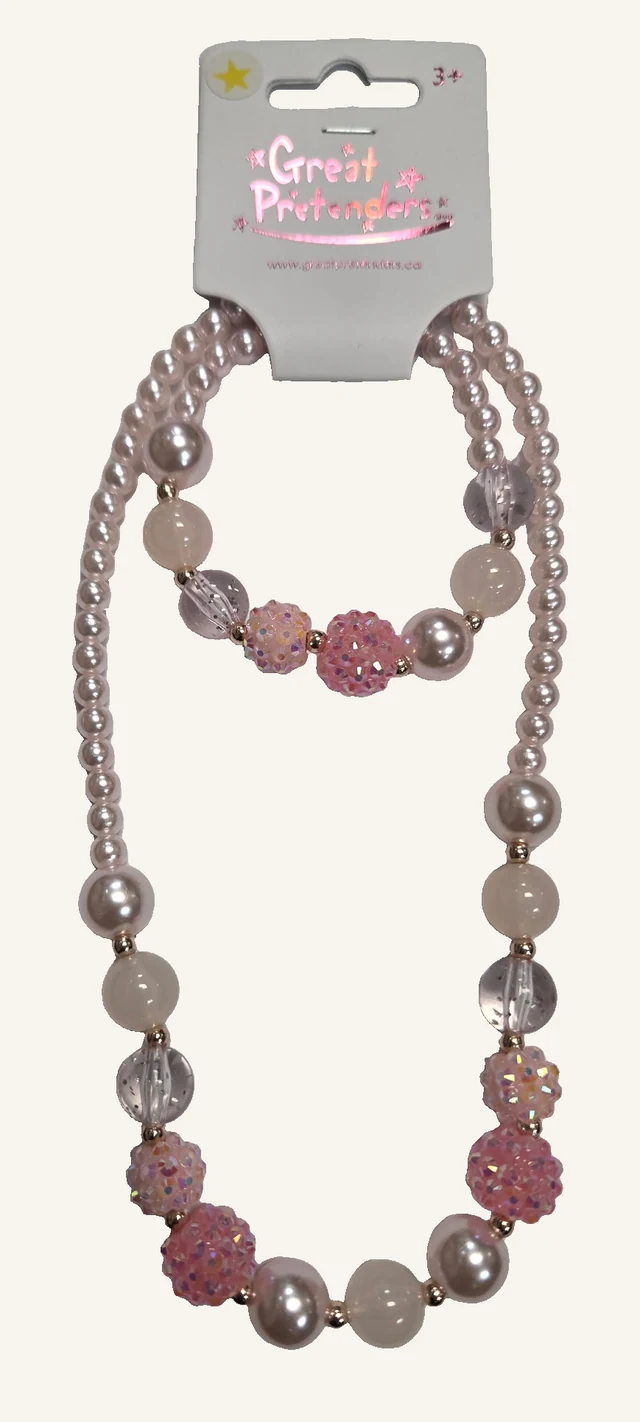 Actual Pinky Pearl necklace and bracelet with pale pink pearl-like beads and sparkling bobbles