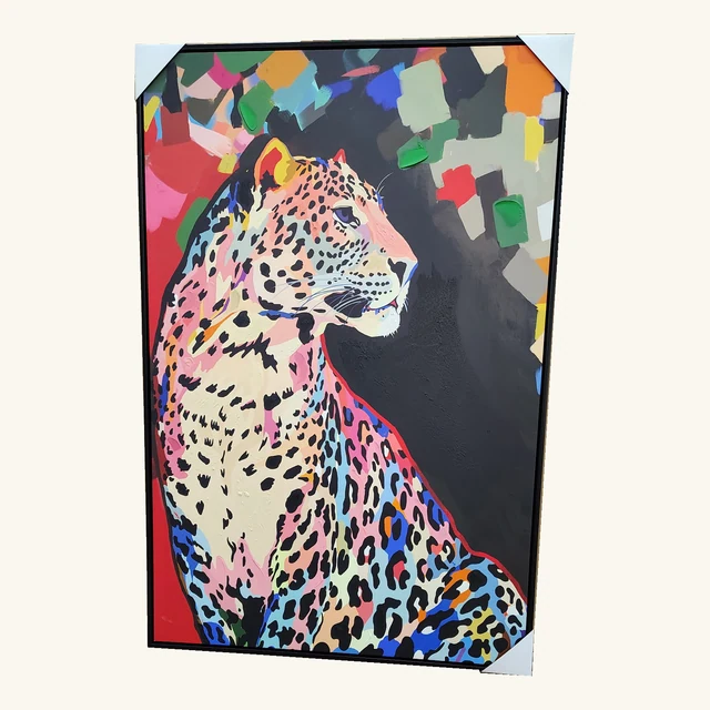 Complete Prismatic Leopard framed artwork showing a colorful spotted leopard facing right among abstract color blocks, retaining its black frame and three original white protective corners