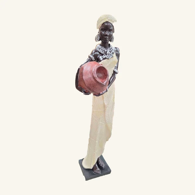 One standing woman figurine in a textured cream dress and headwrap with original silver-tone jewelry, holding a reddish-brown pot on a complete dark base