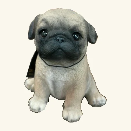 Seated tan-and-cream pug puppy figurine with a dark muzzle, folded ears, dark eyes and its original hang tag.