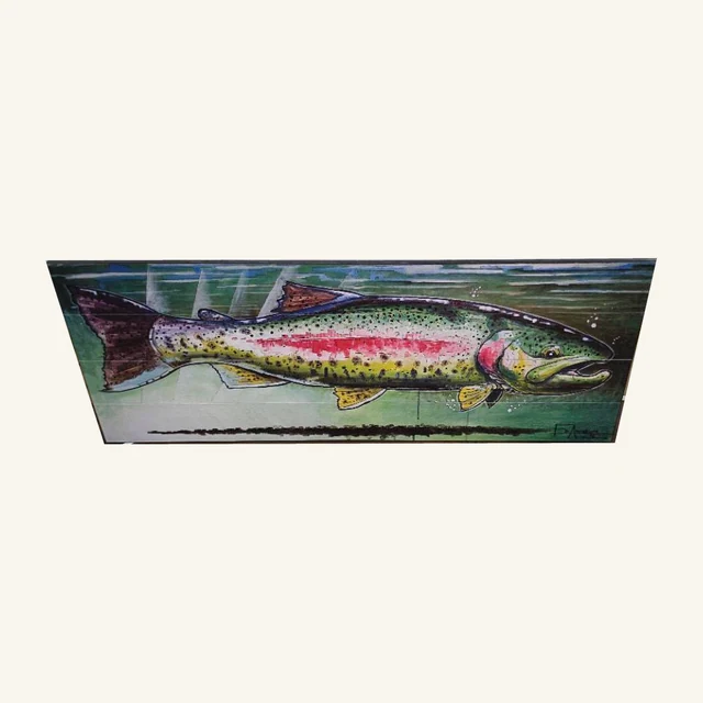 Resting Rainbow wall art with its actual colorful trout, green background, plank details and lower-right monogram