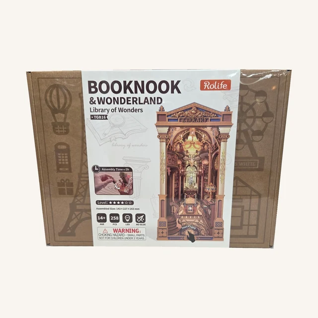 Complete retail box of the Library of Wonders — Book Nook Kit, with its original printed artwork and model details.