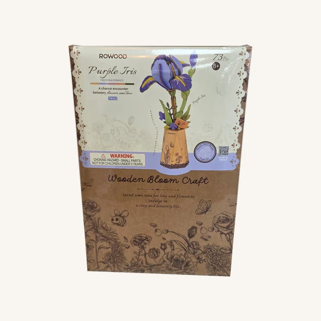 Complete retail box of the Purple Iris Wooden Bloom Craft Kit, retaining its original printed artwork, model code and wrapping.