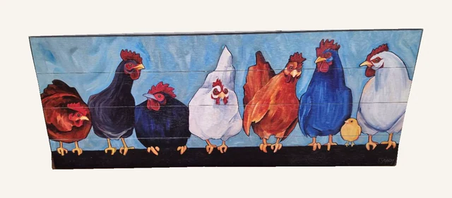Wide blue Rumors Chickens wood sign with colorful chickens, a small yellow chick and its original signature.
