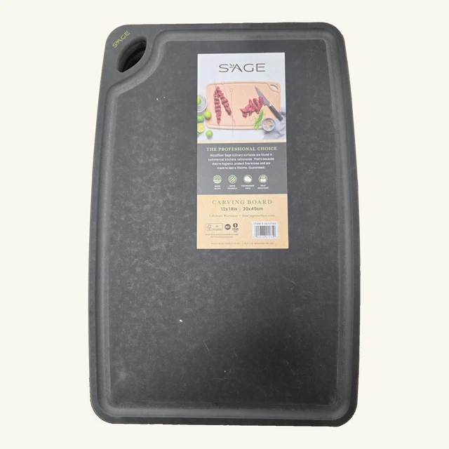 Slate-and-black Sage carving board with four rounded corners, juice groove, handhold and its original product label.