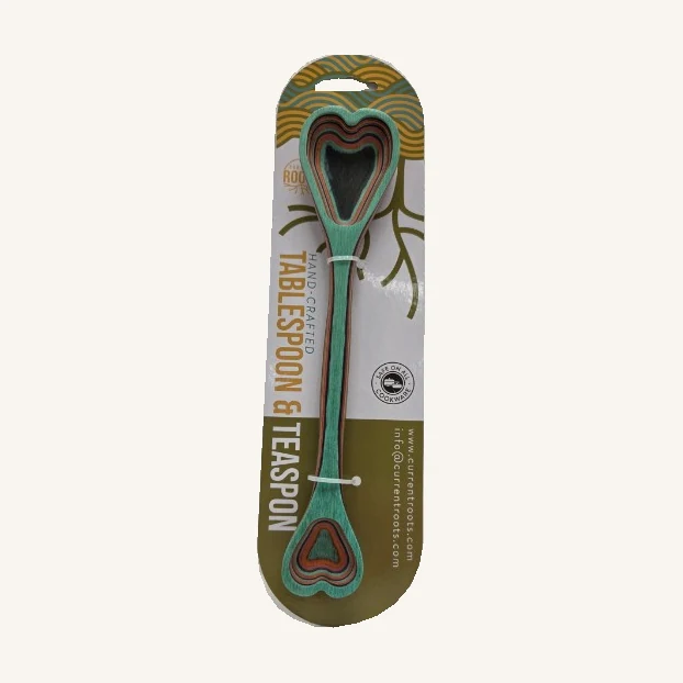 Shakka Guava Double-Sided Measuring Spoon. A tablespoon and teaspoon share one colorful double-ended spoon, with a heart detail at each end.