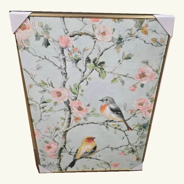 Complete Songbird Garden II framed artwork showing two colorful birds among branching pink blossoms and green leaves on a pale blue-green background, retaining its slim gold-tone frame and all four original white protective corners