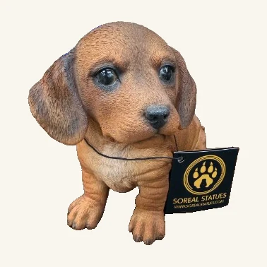 SOREAL Dachshund Figurine. Expressive eyes and lifelike fur texture give this little dachshund figurine its endearing character.