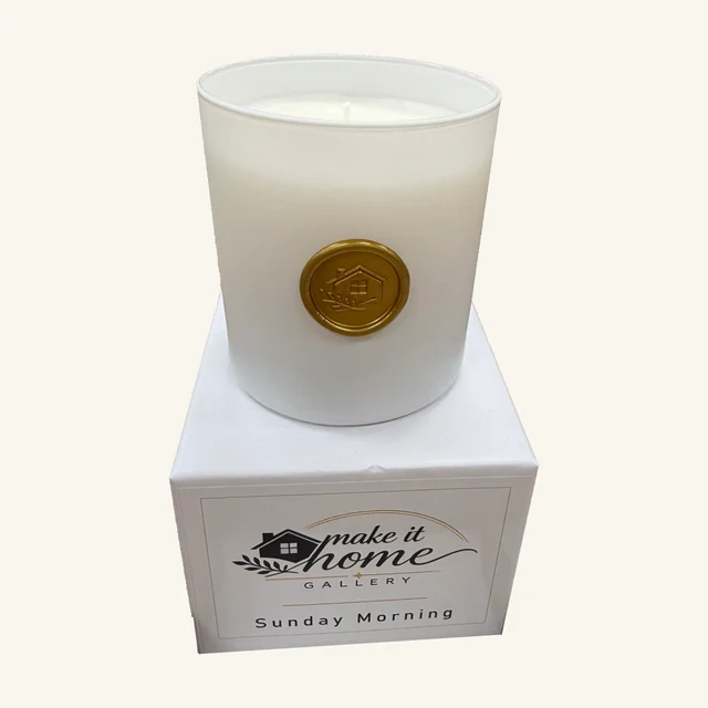 Complete white Sunday Morning candle with original gold gallery seal and matching labeled box