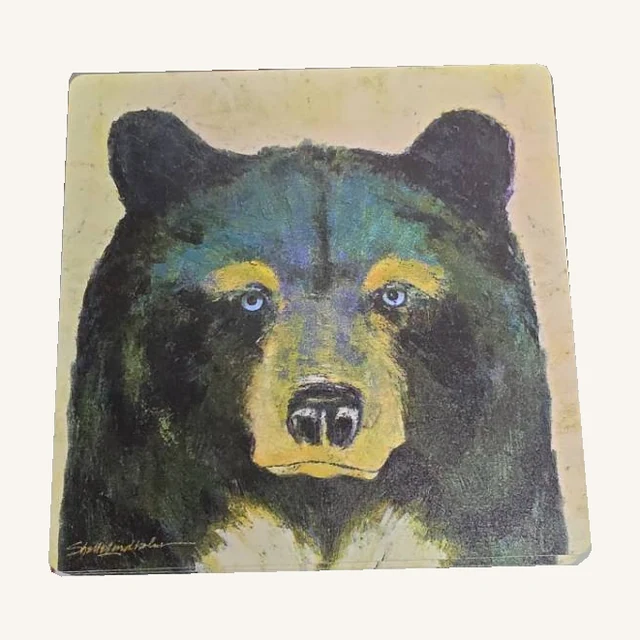 One unwrapped Timber wood coaster with a black-bear portrait and complete rounded corners