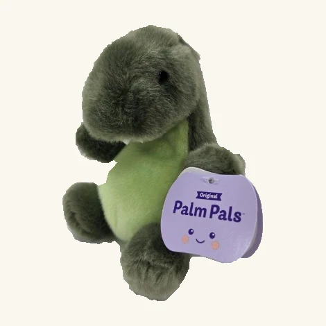 Olive-green Tyranno Rex Palm Pals plush with a light green belly and its original purple retail tag