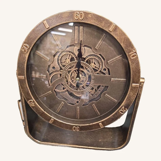 Round aged gold-tone Urban table clock with its actual hands, gear-design face and freestanding base