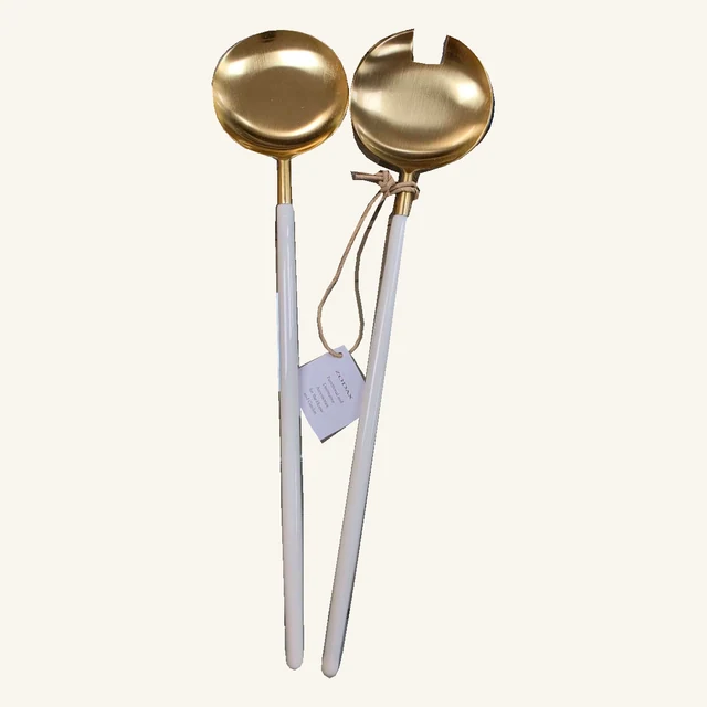 Complete Villefranche serving spoon and notched server with original gold-tone heads, curved white handles, tied cord and printed Zodax tag