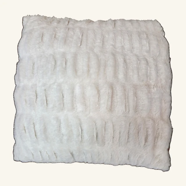 Complete white square faux-rabbit-fur pillow with raised textured stripes